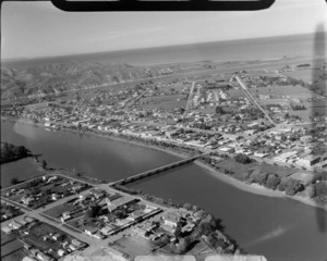 The coastal town of Wairoa with State Highway 2 Bridge over the Wairoa River, looking south to the Wairoa River mouth, Hawke's Bay Region