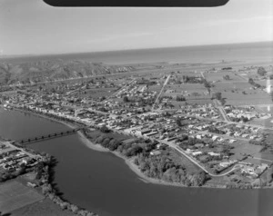 The coastal town of Wairoa with State Highway 2 Bridge over the Wairoa River in foreground looking south to the Wairoa River Mouth, Hawke's Bay Region
