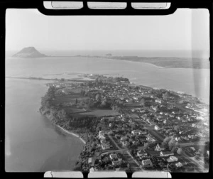 The city of Tauranga looking north to Mount Maunganui with Cameron Road in foreground and the Tauranga Domain, Bay of Plenty Region