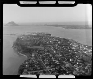 The city of Tauranga looking north to Mount Maunganui with Cameron Road in foreground and the Tauranga Domain, Bay of Plenty Region