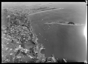 View over the hill suburb of Stepneyville with the Port of Nelson wharves in foreground to Haulashore Island and Tahunanui Beach, Nelson City