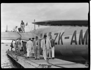 Tasman Empire Airways flying boat, RMA New Zealand ZK-AME, Fiji, identified - Hon A A Ragg, MLC (left), Sir Henry Scott, KC and W F Hargreaves (Manager Suva Branch Bank of New South Wales)