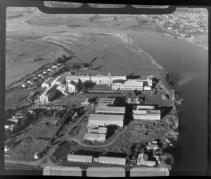 View of the Whakatane Paper Mills factory on the left bank of the Whakatane River, opposite the town of Whakatane, Bay of Plenty Region