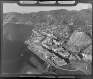 The town of Whakatane with river harbour area and Kakahoroa Drive in foreground, with Waiewe Camellia Hill Park beyond, Bay of Plenty Region