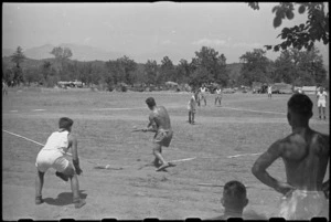 Softball game in progress between 28 and 27 Batteries at 5 Field Regiment Gymkhana, Arce, Italy, World War II - Photograph taken by George Bull