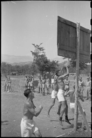 Basketball game between 47 and 28 Batteries at 5 NZ Field Regiment Gymkhana, Arce, Italy, World War II - Photograph taken by George Bull