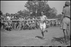 Captain B Brock winning mile race at 5 NZ Field Regiment Gymkhana, Arce, Italy, World War II - Photograph taken by George Bull
