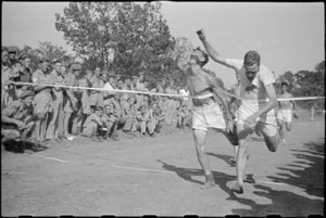 Blain and Cann in dead heat finish in 220 yards race at 5 NZ Field Regiment Gymkhana, Arce, Italy, World War II - Photograph taken by George Bull