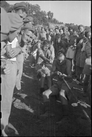 Members of 28 Battery competing in tug-of-war event at 5 NZ Field Regiment Gymkhana, Arce, Italy, World War II - Photograph taken by George Bull