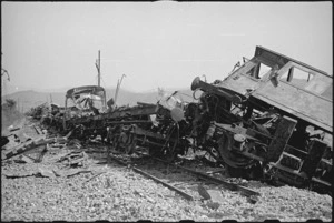 Wrecked train left by retreating German troops in Terontola Station, Italy, World War II - Photograph taken by George Kaye