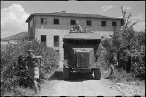 Armoured command vehicle leaving 6 NZ Infantry Brigade Headquarters after capture of Lignano, Italy, World War II - Photograph taken by George Kaye