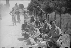Members of 26 New Zealand Battalion who took part in battle for Lignano, Italy, awaiting transport to rear - Photograph taken by George Kaye