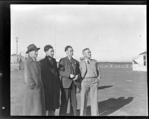 Group of four men, (L to R) J M Mackay (PWD), H J Gough (PWD), W Gellatly (Vacuum Oil Company) and A H [Weirstubb?] (Vacuum Oil Company), Invercargill