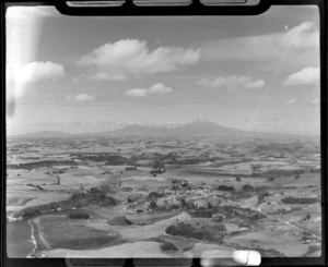 Urenui township and River, Taranaki, including Mt Egmont in the distance