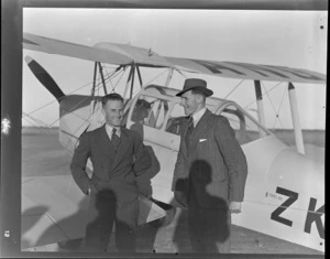 W Willmott (left) and H Wigley, next to his DH Moth ZK-ANG, Tasman