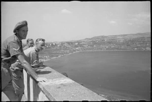 New Zealand Divisional Headquarters personnel looking out over Lake Albano, Italy, World War II - Photograph taken by George Kaye