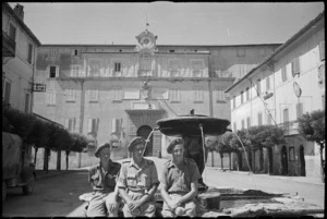 New Zealanders in the square at Castel Gandolfo with the papal summer palace in the background, Italy, World War II - Photograph taken by George Kaye