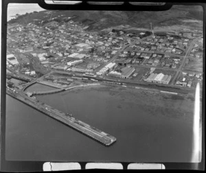 Bluff, Southland, includes industrial area, wharf, boats, township, dairy factory railway line and housing