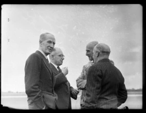 Colonel C W Salmon (left), Mayor of Auckland Mr J A C Allum, Vickers Armstrong Aircraft Section Manager Mr B W A Dickson (back left) and General Manager of NZNAC (New Zealand National Airways Corporation) Mr F M Clarke, at Whenuapai Airbase, Auckland