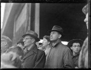 John Kemnitz, left, and Dualey Marrows, DSO, DFC, in crowd at the opening of British Commonwealth Pacific Airlines' trans Pacific service, Whenuapai Airport, Auckland