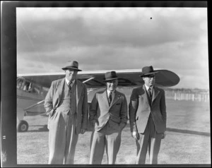 Group at Invercargill Aerodrome, showing, from left, Mr H Miller, Mr A McDonald (president of Southland Aero Club), and Mr R Jones