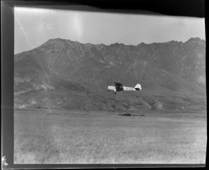 Aircraft ZK-AOB Auster J1B Aiglet, flying, Queenstown, Otago region