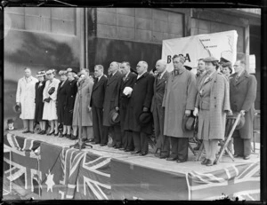Group of dignitaries on stage, at opening ceremony for British Commonwealth Pacific Airlines' trans Pacific service, Whenuapai Airport, Auckland