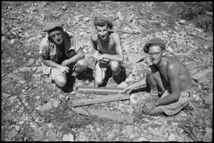 World War II New Zealand engineers examine German anti-vehicle mine during advance to Florence in World War II - Photograph taken by George Kaye