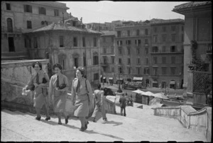 Tuis on leave in Rome ascending steps to church of Trinita di Monti with Keats House on left - Photograph taken by George Kaye