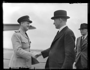 The Honourable F Jones, centre, with Captain P Taylor, left, and an unidentified man, Whenuapai Airport, Auckland