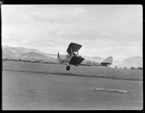 View of the de Havilland D.H.82A Tiger Moth bi-plane ZK-AIT taking off from Omaka Airport, Blenheim, Marlborough Region