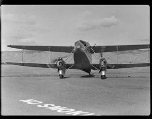 View of the NZ NAC ((National Airways Corporation) De Havilland Dominie 'Tara' bi-plane ZK-AKS taxiing on the runway at Omaka Airport, Blenheim, Marlborough Region