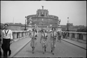 Tuis on leave crossing the Sant' Angelo Bridge with Castel St Angelo in background, Rome, Italy, World War II - Photograph taken by George Kaye