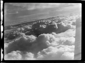 View of clouds from the visiting British Vickers Viking passenger plane G- AJJN while in flight