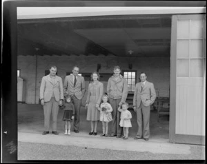 Otago Aero Club group, showing four men, a woman and three small girls, including J Hazeldine and J Day