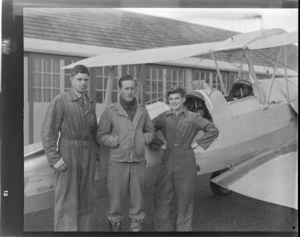 Otago Aero Club, (L to R) R Poynter (Engineer), R Bush (Instructor) and J Atkinson (Assistant Engineer), next to an Auster airplane