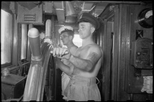 Coxwain and wireless operator in the wheelhouse of a World War II minesweeper in the Adriatic - Photograph taken by George Bull