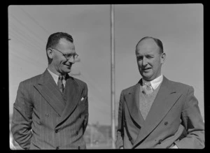 Portrait of (L to R) Mr A P S Bell (Secretary NZ Airline Pilots Association) and Mr K A Brownjohn of TEAL, [Mechanics Bay, Auckland City?]