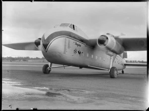 Front view of visiting Bristol Freighter transport plane 'Merchant Venturer' G-AIMC taxiing on runway, Whenuapai Airfield, Auckland