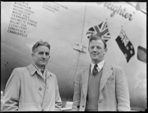 Portrait of (L to R) Mr W Burns (Engineer) and Captain R Ellison, crew members with Bristol Freighter transport plane 'Merchant Venturer' G- AIMC, Whenuapai Airfield, Auckland