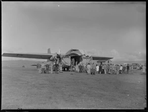Crowd of people in front of a Bristol Freighter aircraft, Kaikohe
