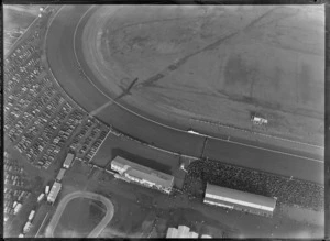 Avondale Racecourse, Auckland, including large crowd of people and parked motorcars
