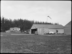 Bristol Freighter tour, Hawkes Bay and East Coast Aero Club, Hastings, showing hangar and Clubhouse at Bridge Pa airfield