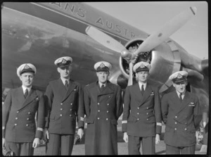 TAA (Trans Australia AIrlines), flight crew for aircraft McDouall Stuart, Flight Officer W Waterlow (left), Captains L E Money and R A Meates, Radio Officer W Kerr and new officer R S Nielsen, unidentified location