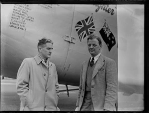 Portrait of (L to R) Mr W Burns (Engineer) and Captain R Ellison, crew members with Bristol Freighter transport plane 'Merchant Venturer' G-AIMC, Whenuapai Airfield, Auckland