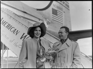 Portrait of Herta Glaz , Austrian opera singer, with her accompanist [Mr Behrman?], passengers on a Pan American World Airways flight