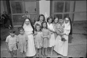 Two San Felice Convent sisters and civilian Red Cross workers with World War II refugee children in Florence, Italy - Photograph taken by George Kaye