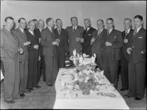 Unidentified group of men attending a party at Central Hotel for Captain Garrett