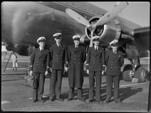 TAA (Trans Australia Airlines) fight crew - Flight Officer W Waterlaw, Captains L E Money and R A Meates, Radio Officer W Kerr and new officer R S Nielsen, for aircraft VH-TAD McDouall Stuart, Whenuapai Air Base, Auckland