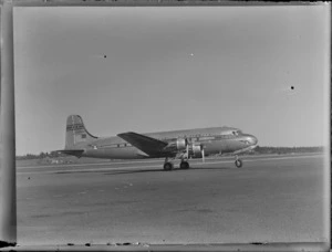 View of PAWA Clipper Celestial NC 88959 passenger plane on the runway, Whenuapai Airfield, Auckland